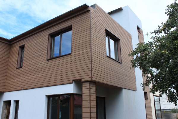 Дом из Фасадной доски из древесно-полимерного композита